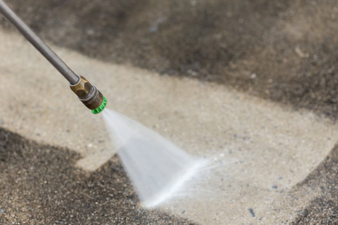 Outdoor floor cleaning with high pressure water jet